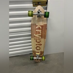 Longboard with Green Wheels